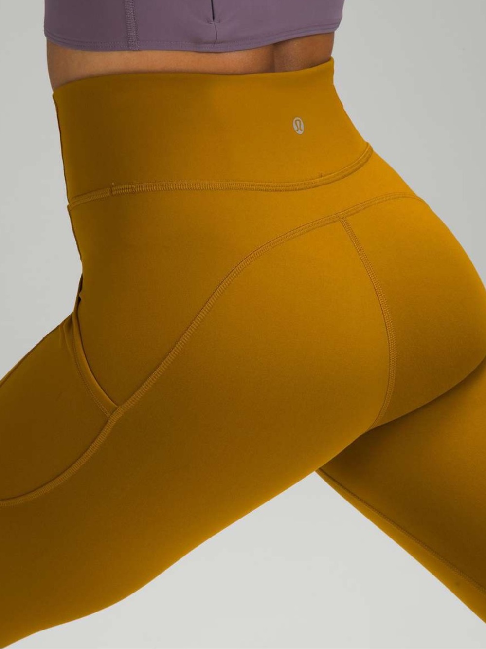 Lululemon Align High-Rise Pants with Pockets in the vibrant "Gold Spice"